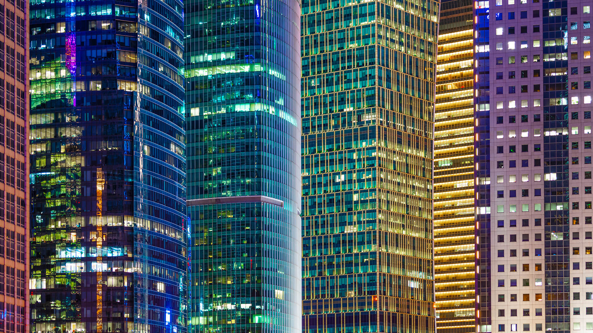 Skyscraper neighbourhood at night.